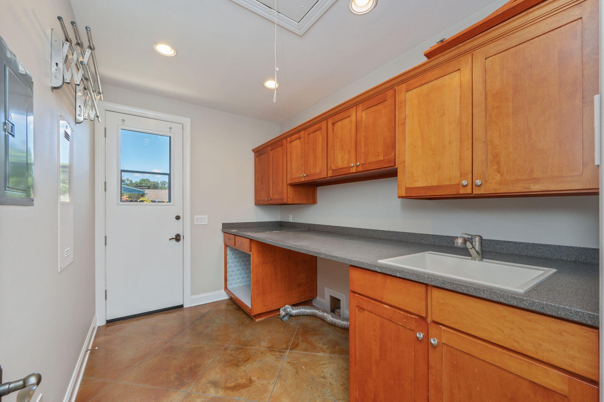 14 Blenheim Road Shalimar, FL 32579 - Photo 39 of 71 a room with stainless steel appliances granite countertop a sink cabinets and a window