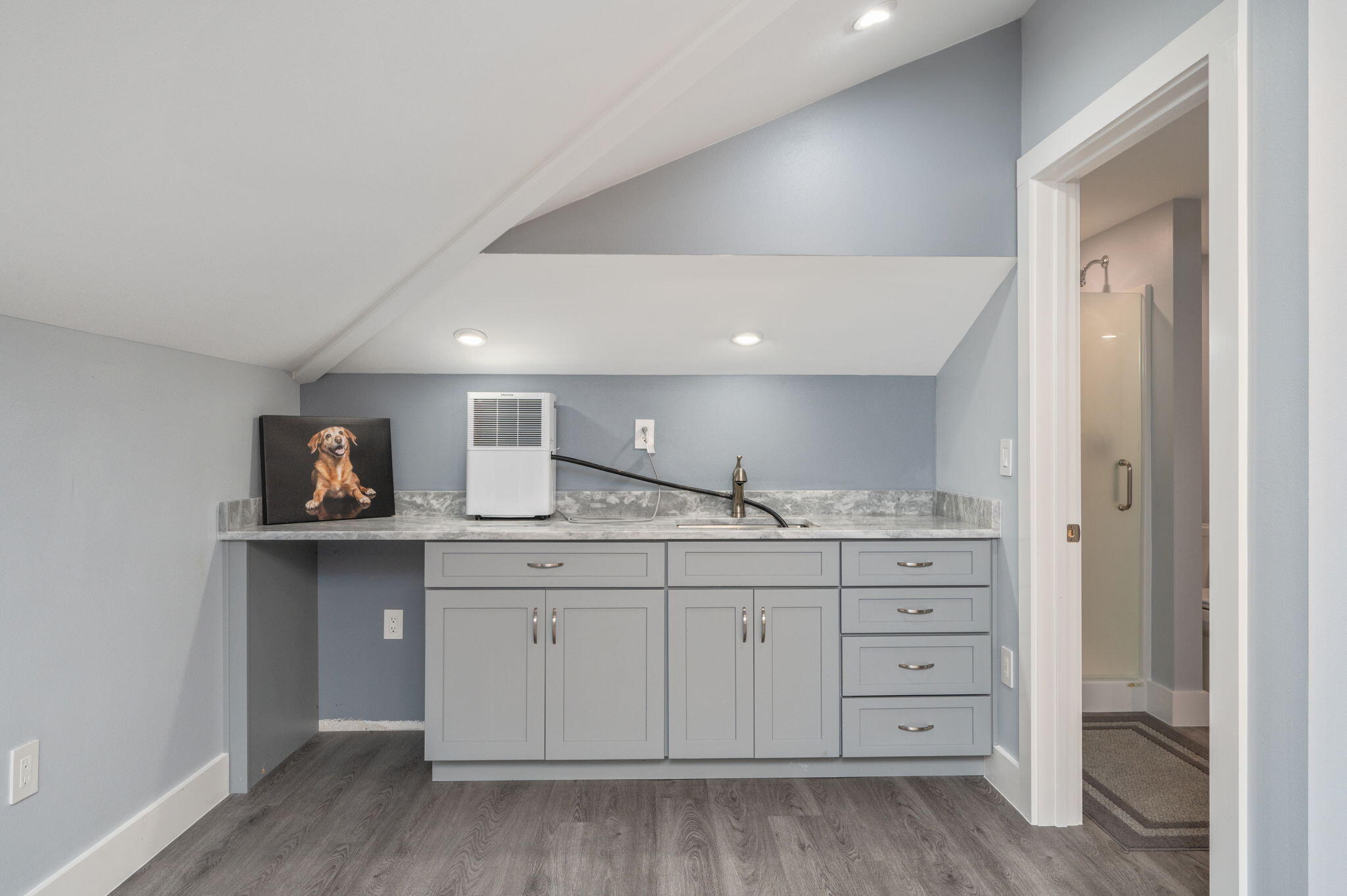 14 Blenheim Road Shalimar, FL 32579 - Photo 43 of 71 a hall with cabinets and a wooden floor