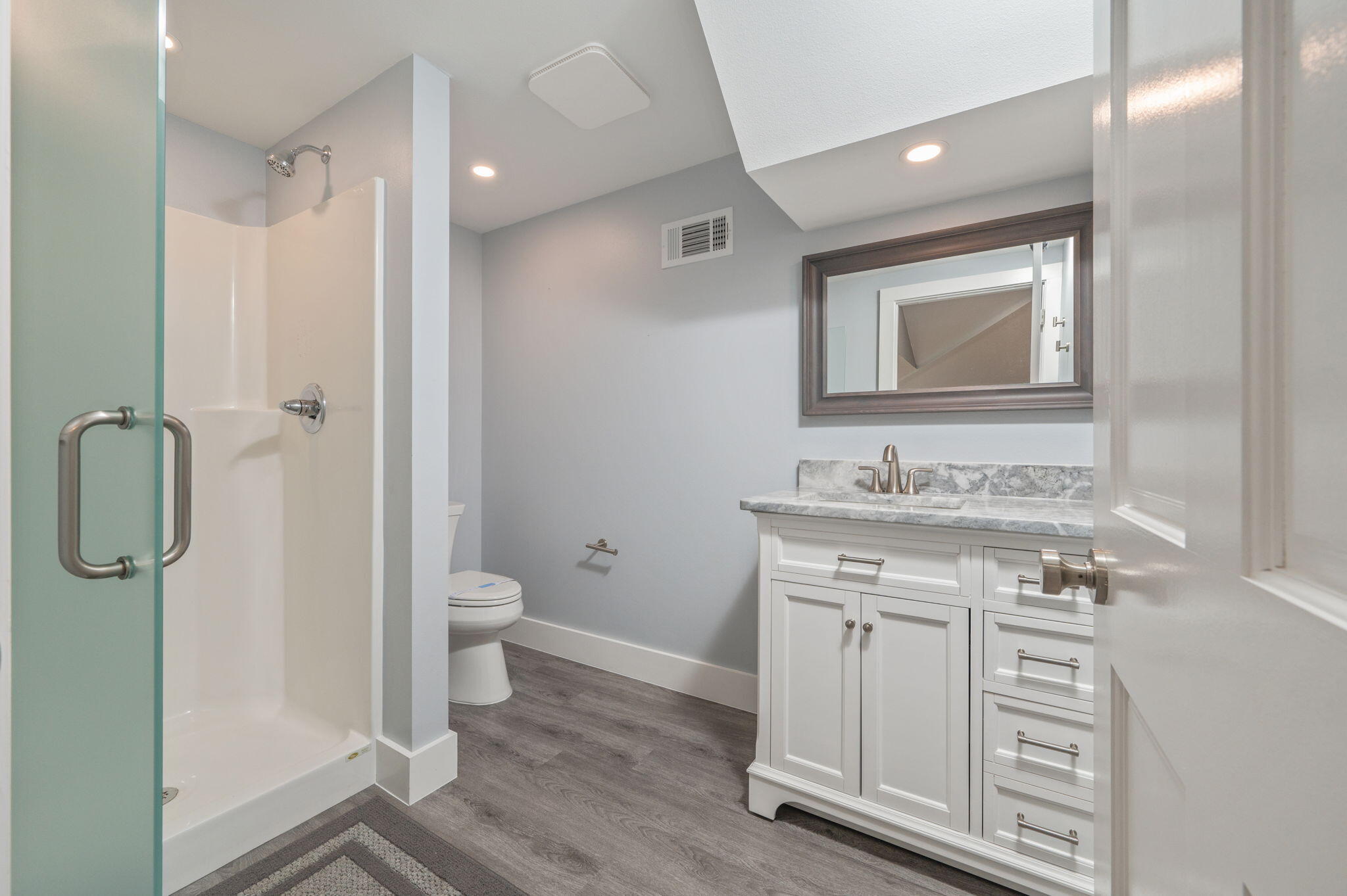 14 Blenheim Road Shalimar, FL 32579 - Photo 44 of 71 a bathroom with a granite countertop sink toilet and shower