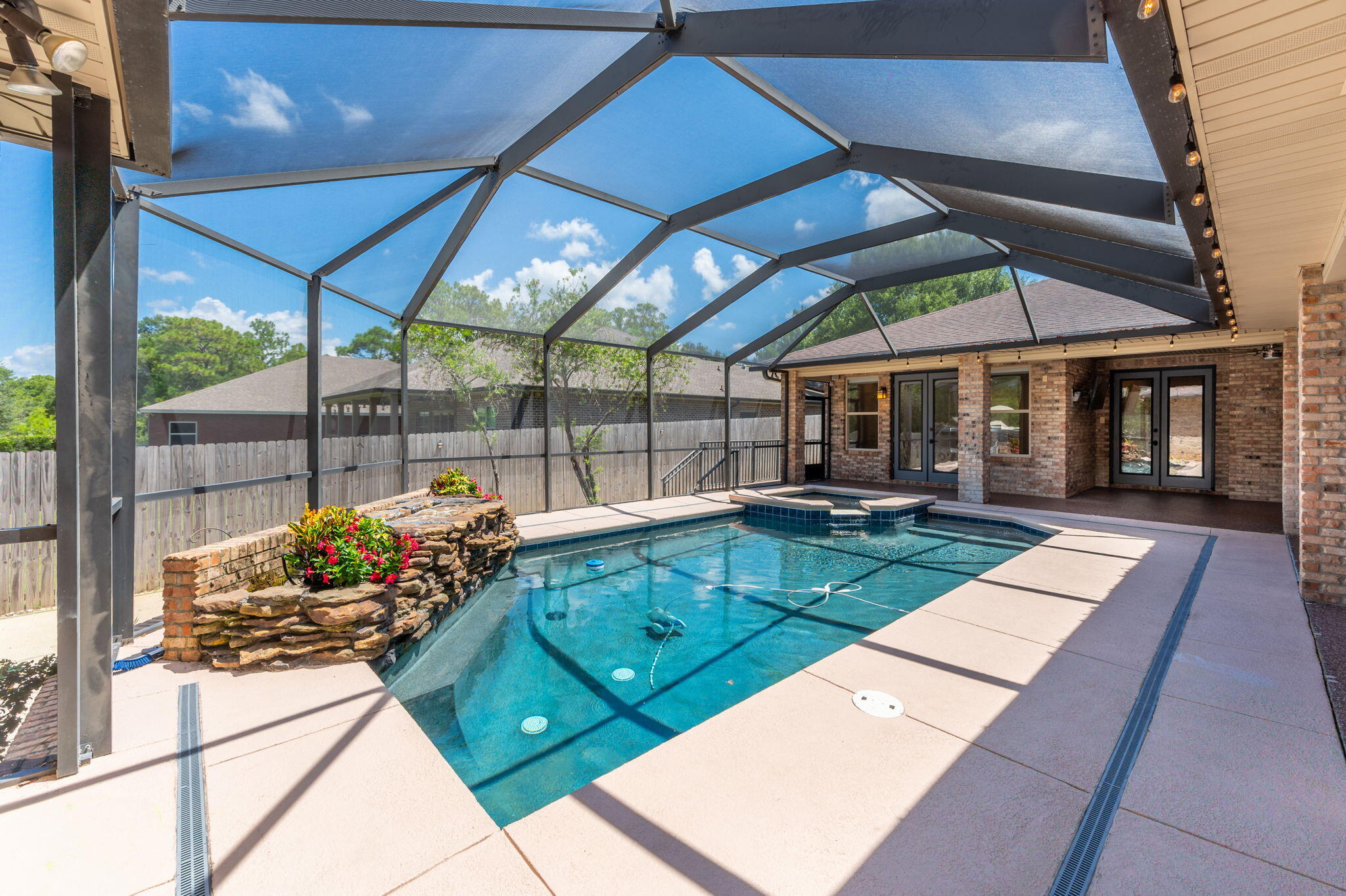 14 Blenheim Road Shalimar, FL 32579 - Photo 57 of 71 a view of a backyard with sitting area