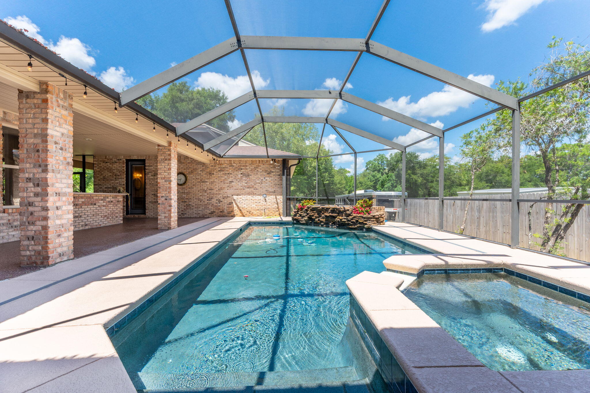 14 Blenheim Road Shalimar, FL 32579 - Photo 61 of 71 a view of a swimming pool with a patio