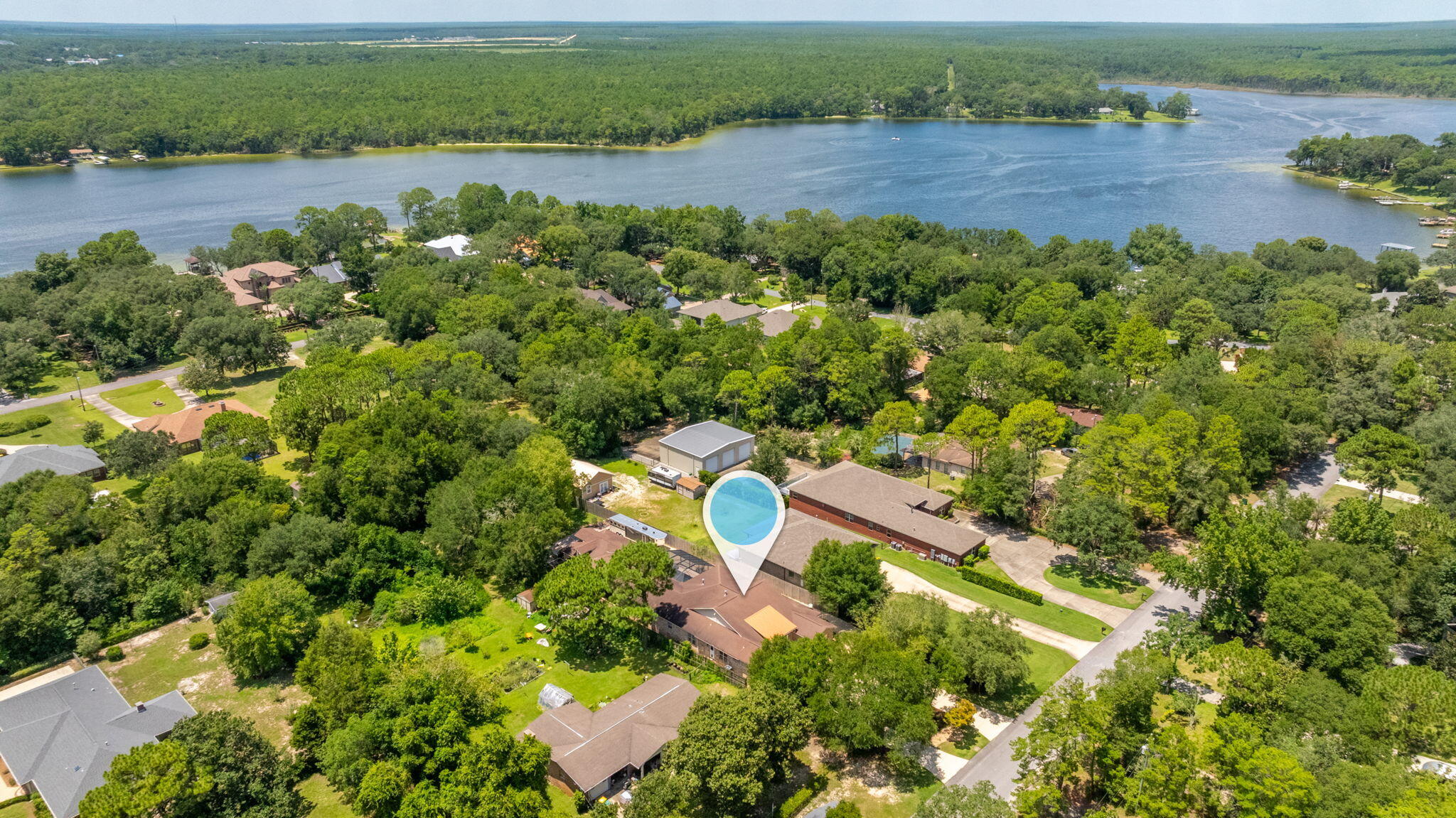 14 Blenheim Road Shalimar, FL 32579 - Photo 68 of 71 an aerial view of a house with outdoor space and lake view