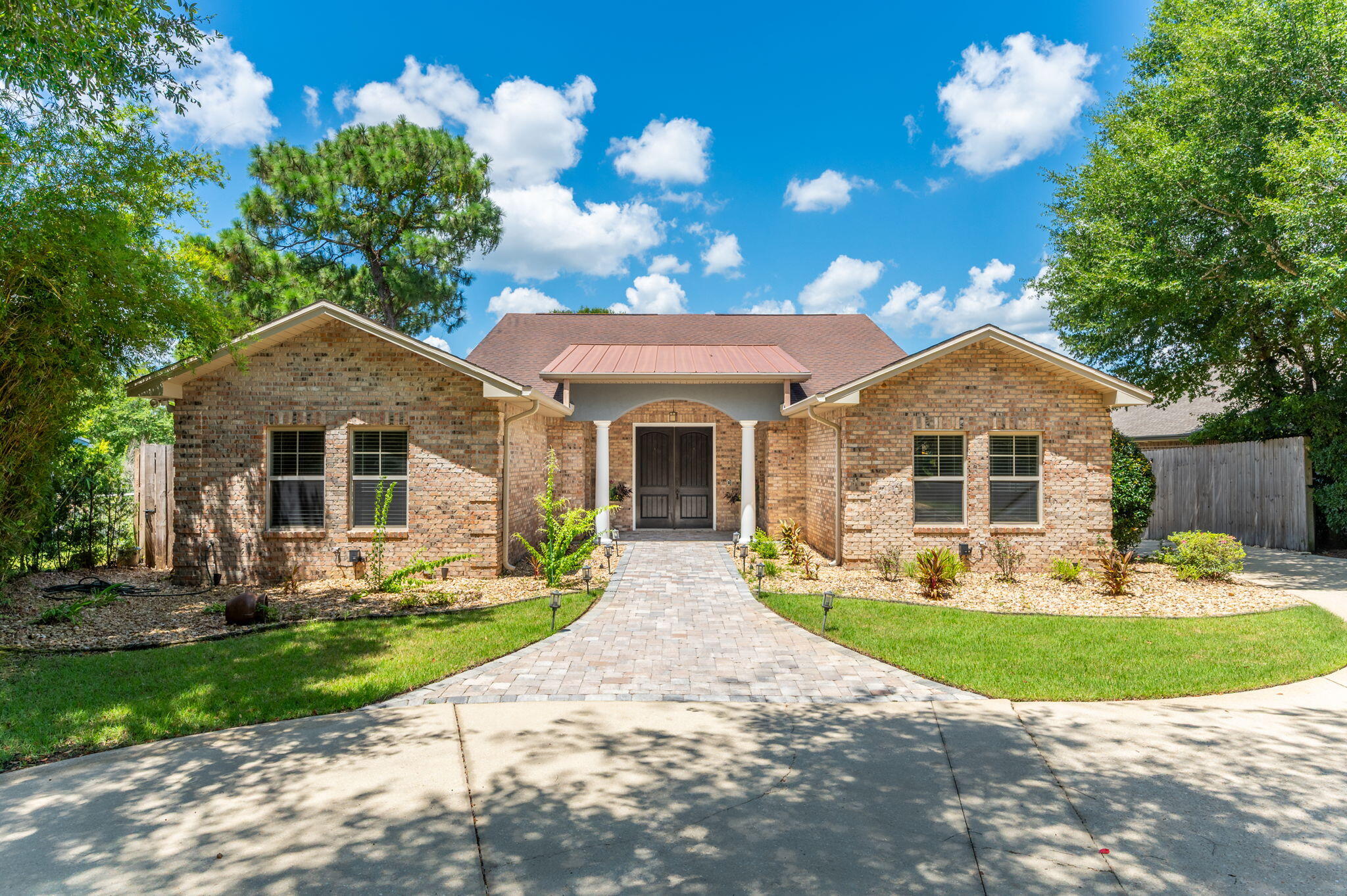 14 Blenheim Road Shalimar, FL 32579 - Photo 7 of 71 a front view of a house with garden