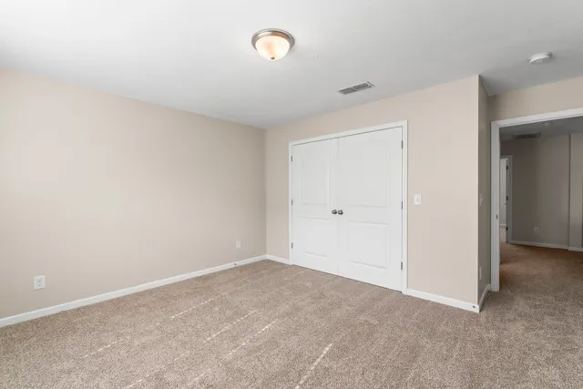 a view of a room with an entryway