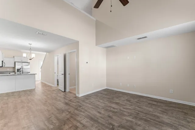 a view of a kitchen with a sink