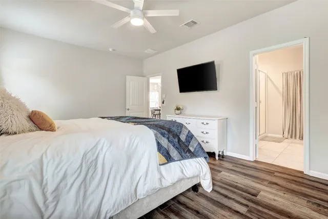 a kitchen with stainless steel appliances a sink and a refrigerator