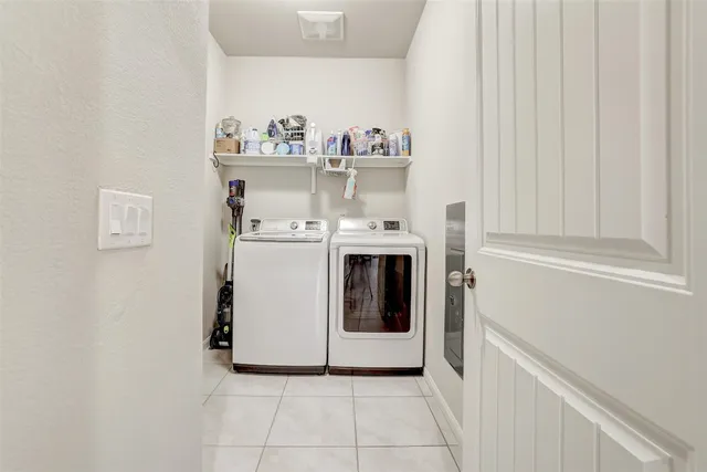 a view of roof deck with patio