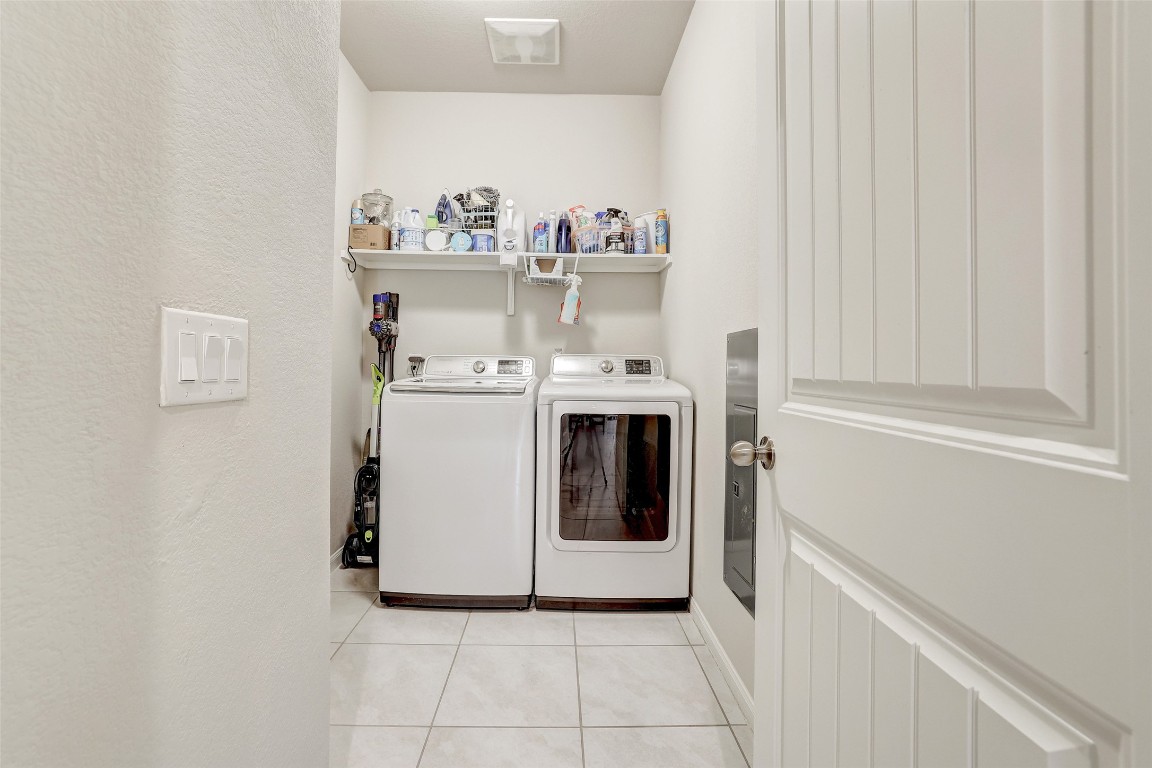 6709 Branrust Drive Austin, TX 78744 - Photo 26 of 35 a utility room with dryer and washer