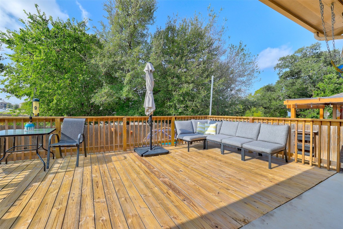 6709 Branrust Drive Austin, TX 78744 - Photo 27 of 35 a view of roof deck with wooden floor and seating