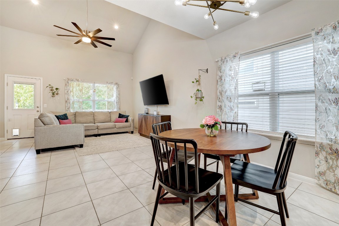 6709 Branrust Drive Austin, TX 78744 - Photo 9 of 35 a view of a dining room with furniture and a chandelier