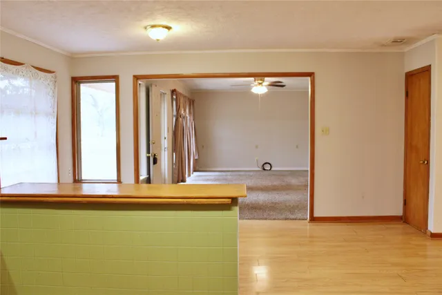 a view of a bathroom with a glass door
