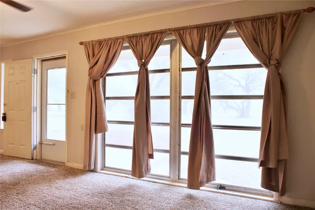 an empty room with window