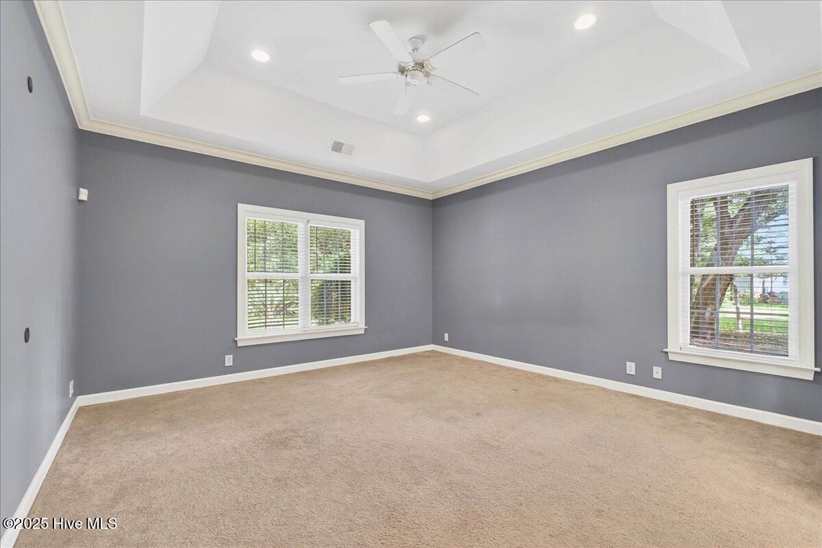 8985 Woodbine Road Southwest Sunset Beach, NC 28468 - Photo 28 of 65 Primary bedroom