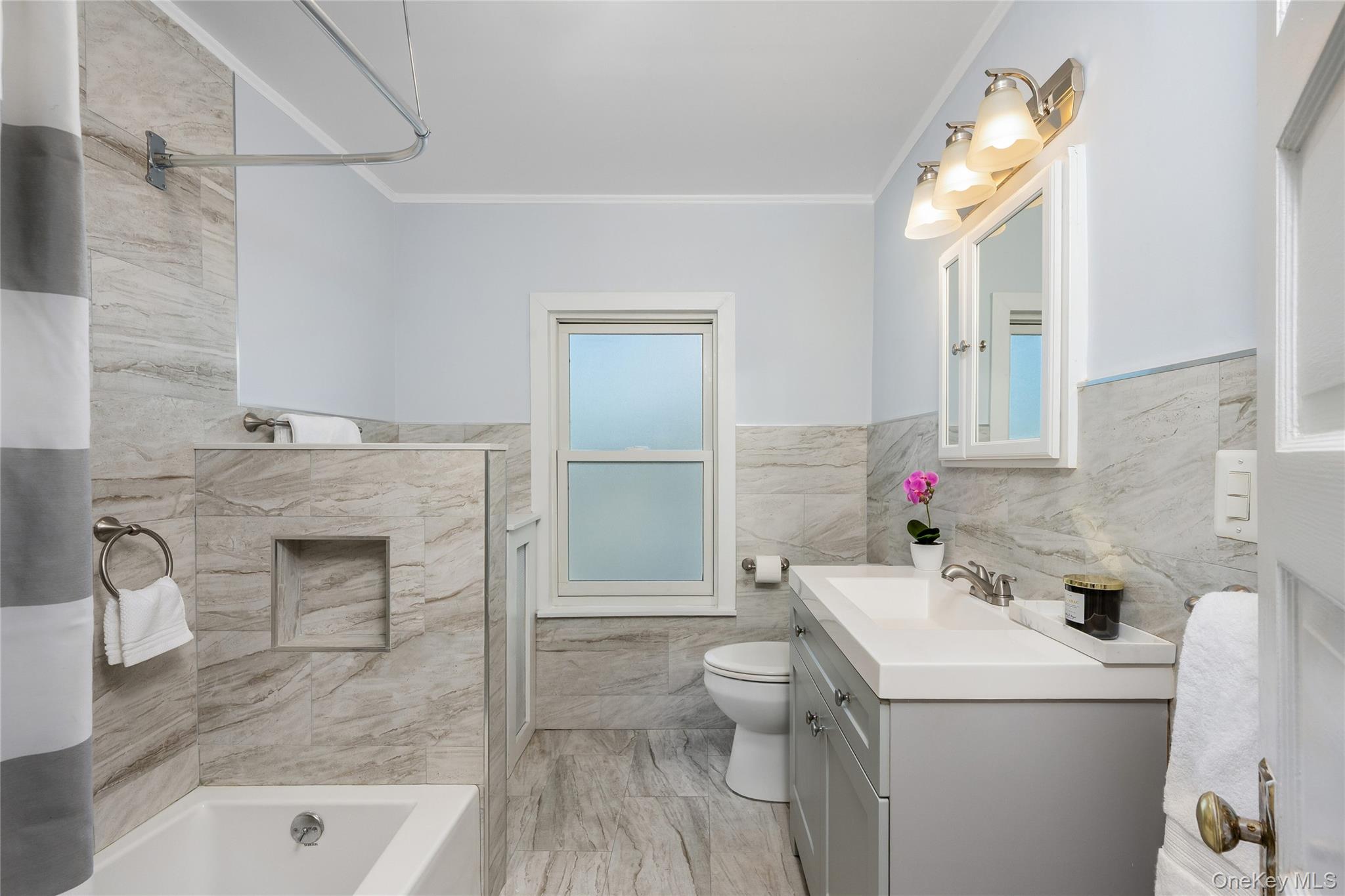 41 French Ridge New Rochelle, NY 10801 - Photo 33 of 50 a bathroom with a sink toilet and shower