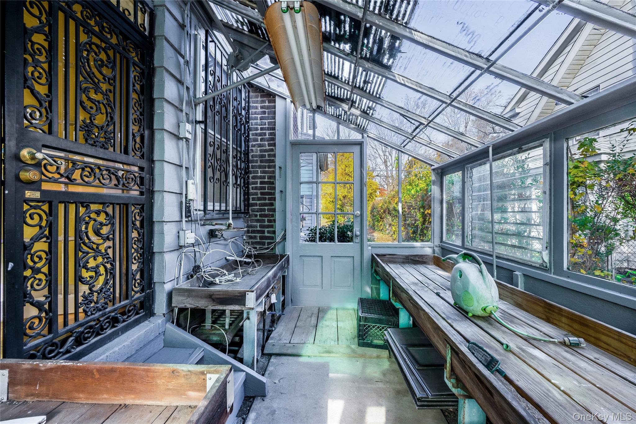 41 French Ridge New Rochelle, NY 10801 - Photo 37 of 50 a room with lots of furniture and a chandelier