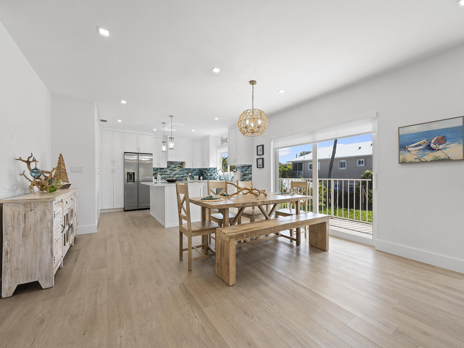 22 Atlantic Boulevard, Unit B Key Largo, FL 33037 - Photo 16 of 50 a very nice looking living room with kitchen and furniture