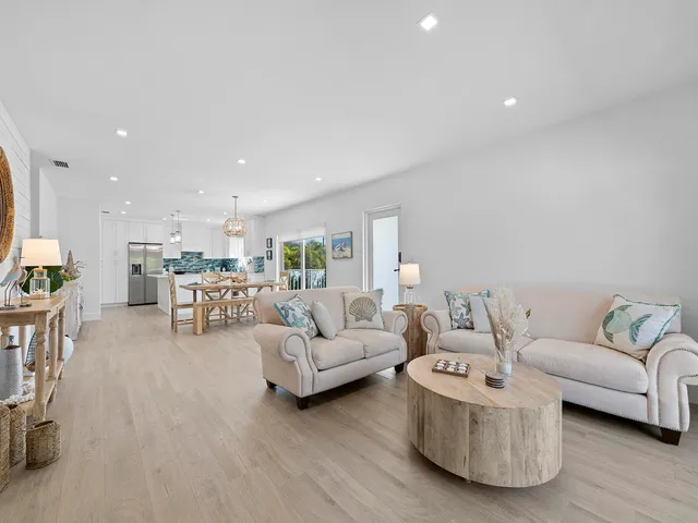 a living room with furniture and a table