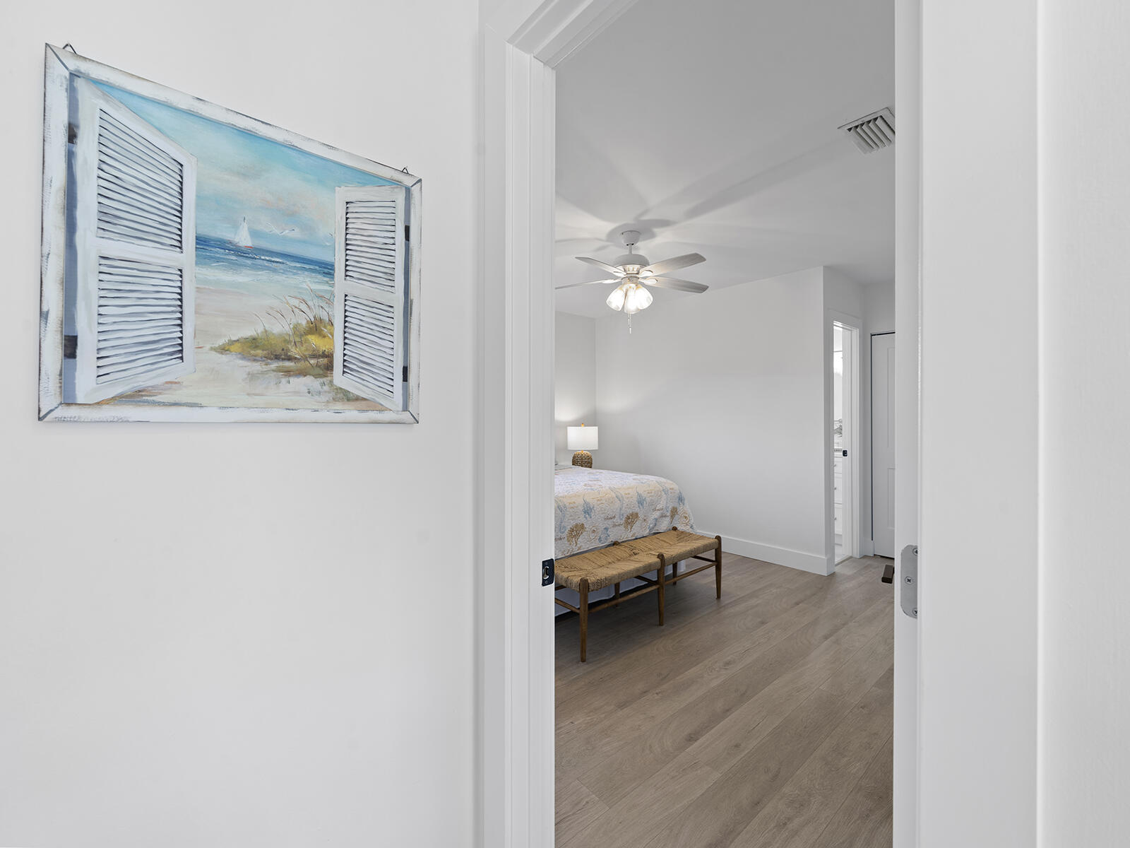 22 Atlantic Boulevard, Unit B Key Largo, FL 33037 - Photo 19 of 50 a view of a bedroom with wooden floor