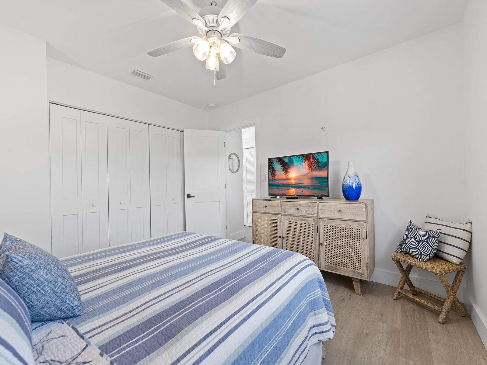 22 Atlantic Boulevard, Unit B Key Largo, FL 33037 - Photo 28 of 50 a bedroom with a bed and a flat screen tv