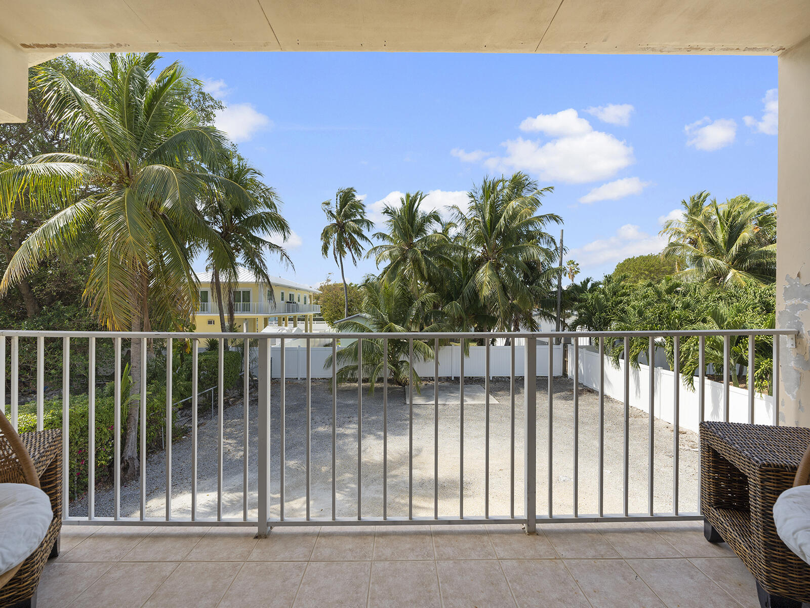 22 Atlantic Boulevard, Unit B Key Largo, FL 33037 - Photo 29 of 50 a view of a balcony with a lake view