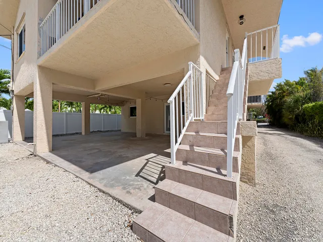 a view of an entryway with staircase