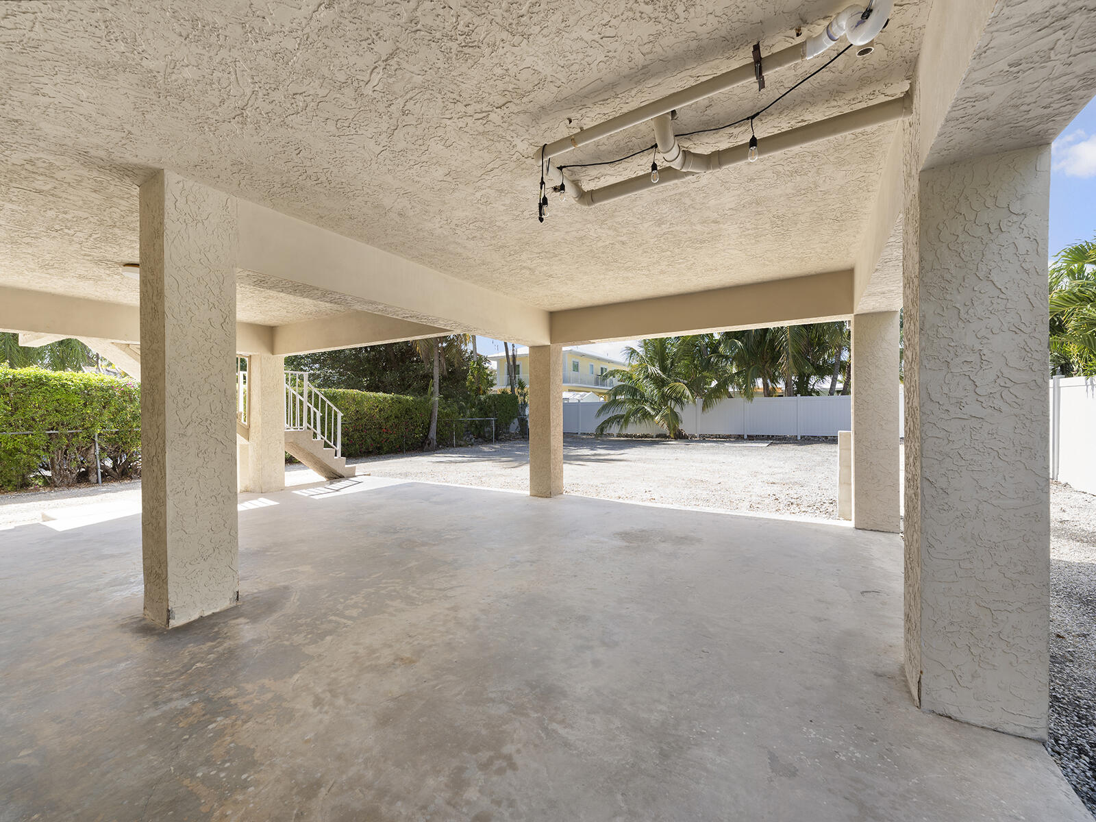 22 Atlantic Boulevard, Unit B Key Largo, FL 33037 - Photo 37 of 50 a view of a house with porch and a porch