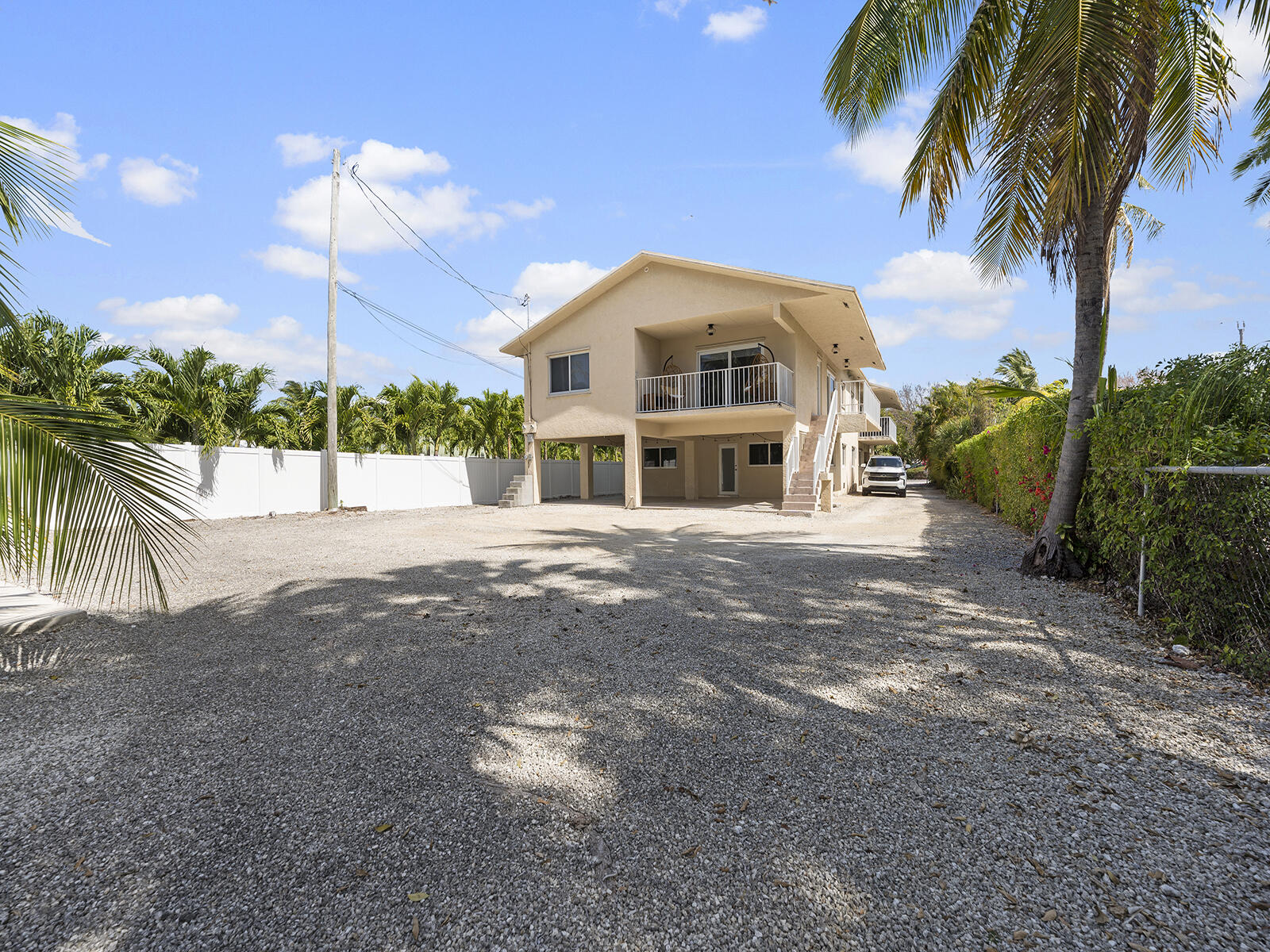 22 Atlantic Boulevard, Unit B Key Largo, FL 33037 - Photo 41 of 50 a view of a house with a yard