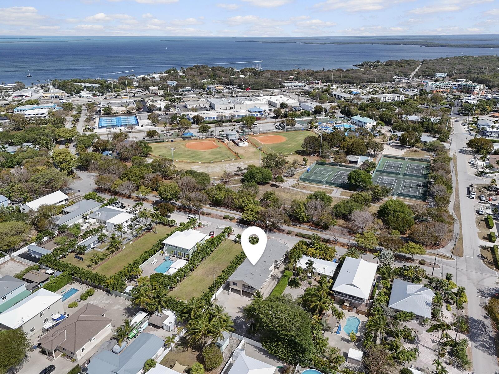 22 Atlantic Boulevard, Unit B Key Largo, FL 33037 - Photo 49 of 50 an aerial view of residential building with parking space