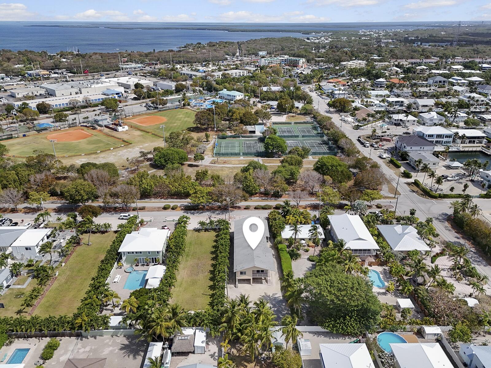 22 Atlantic Boulevard, Unit B Key Largo, FL 33037 - Photo 50 of 50 an aerial view of residential houses with outdoor space