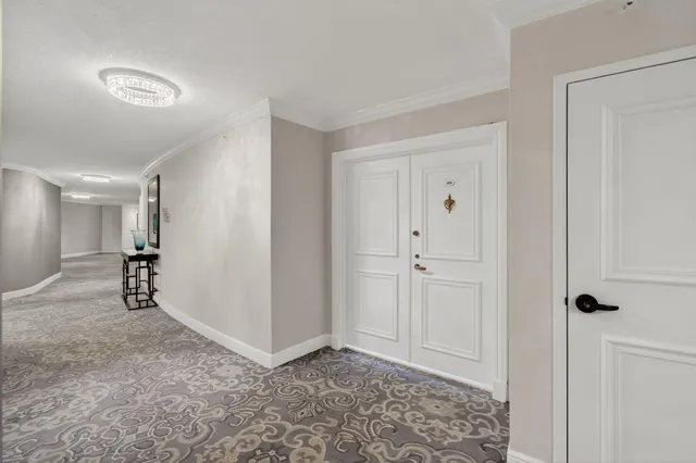 a view of a big room with large windows