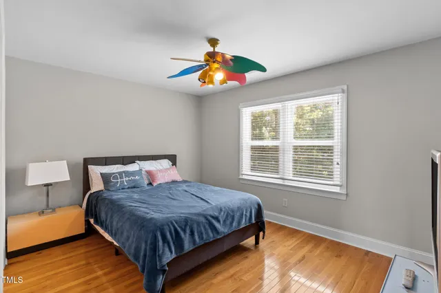 a bathroom with a sink a shower and a mirror