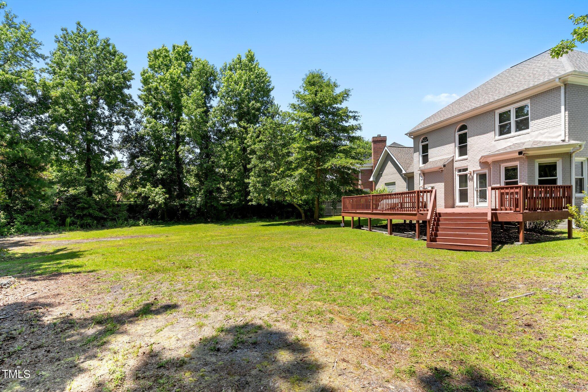 3556 Iris Street Wilmington, NC 28409 - Photo 43 of 52 a view of a house with a big yard