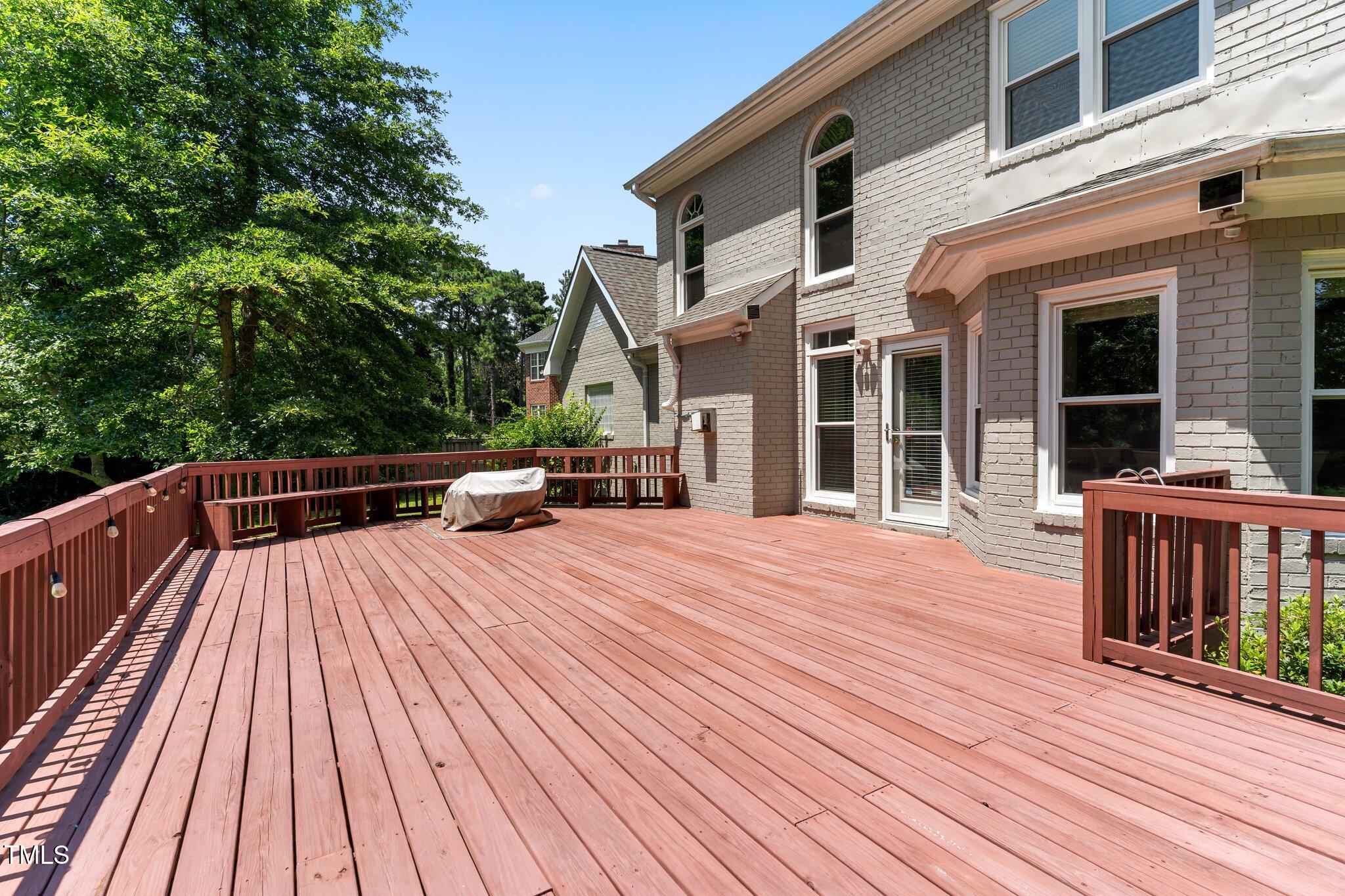 3556 Iris Street Wilmington, NC 28409 - Photo 44 of 52 a view of a house with wooden deck