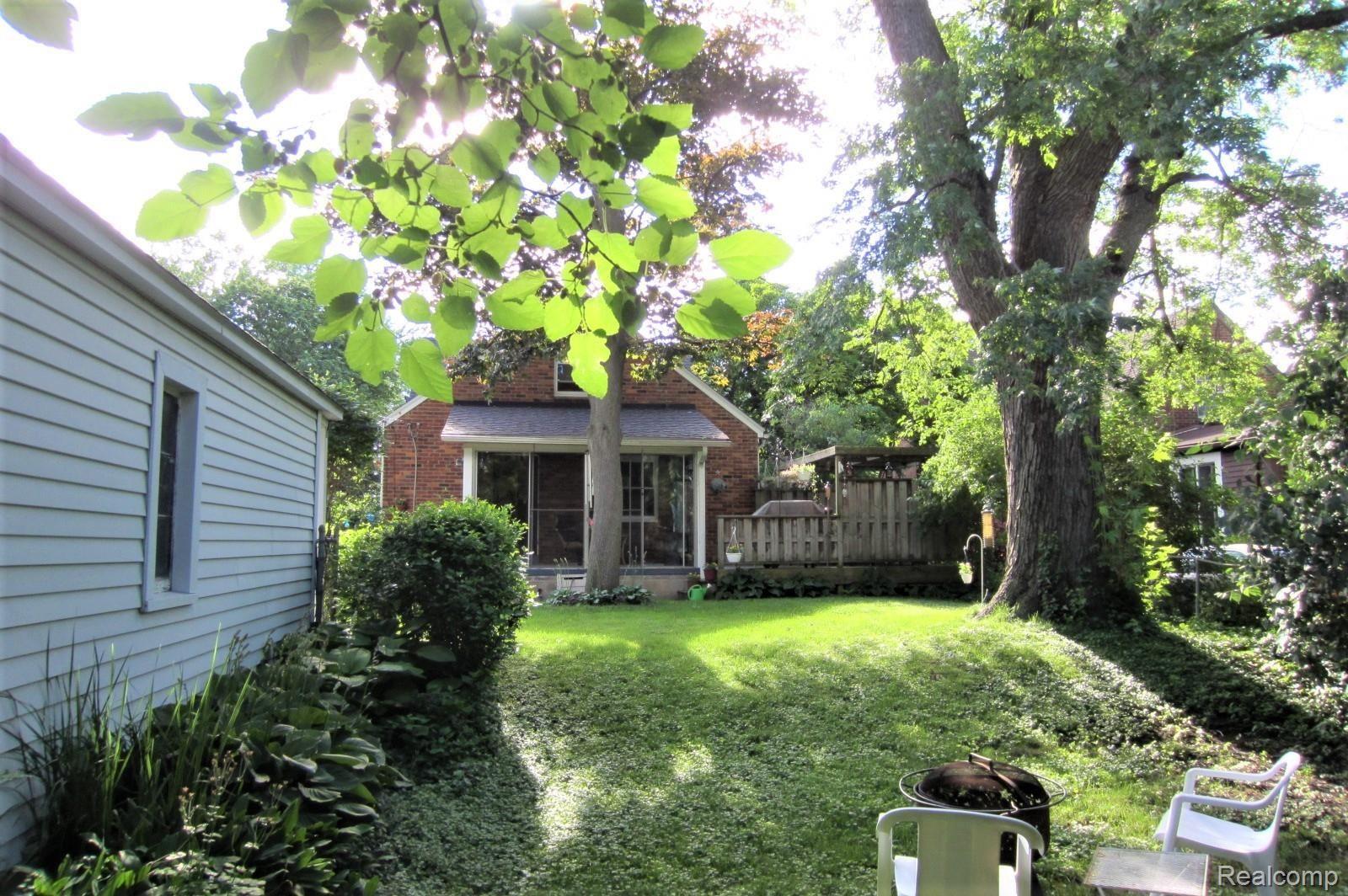 160 Erie Road Pontiac, MI 48341 - Photo 29 of 30 Looking from the west side of the rear yard toward the house. You will enjoy the beautiful perennials throughout the yard!