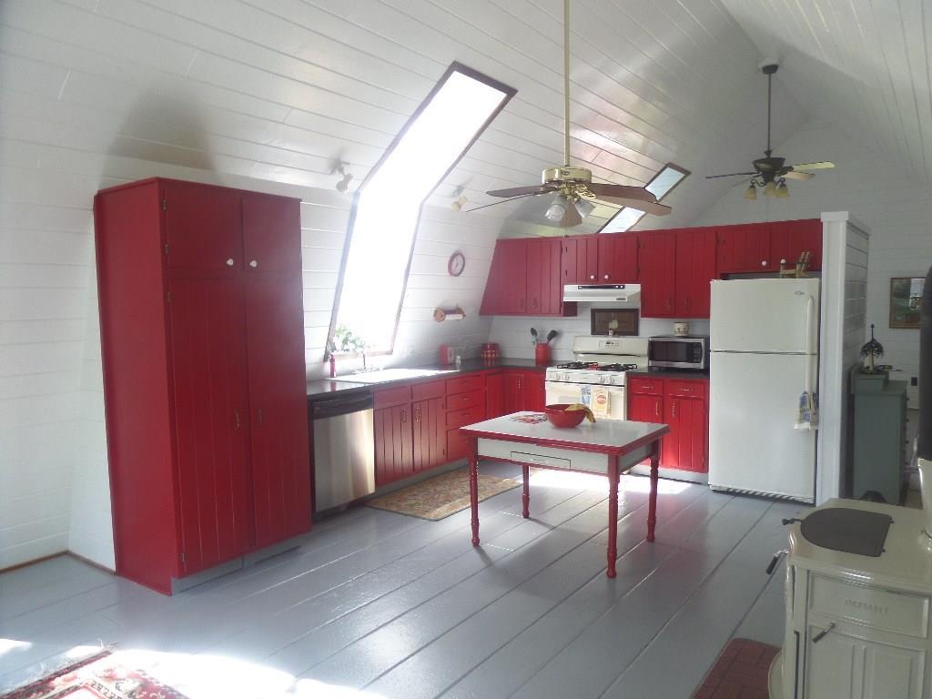 628 Bangor Road Dover-Foxcroft, ME 04426 - Photo 4 of 35 Vibrant kitchen