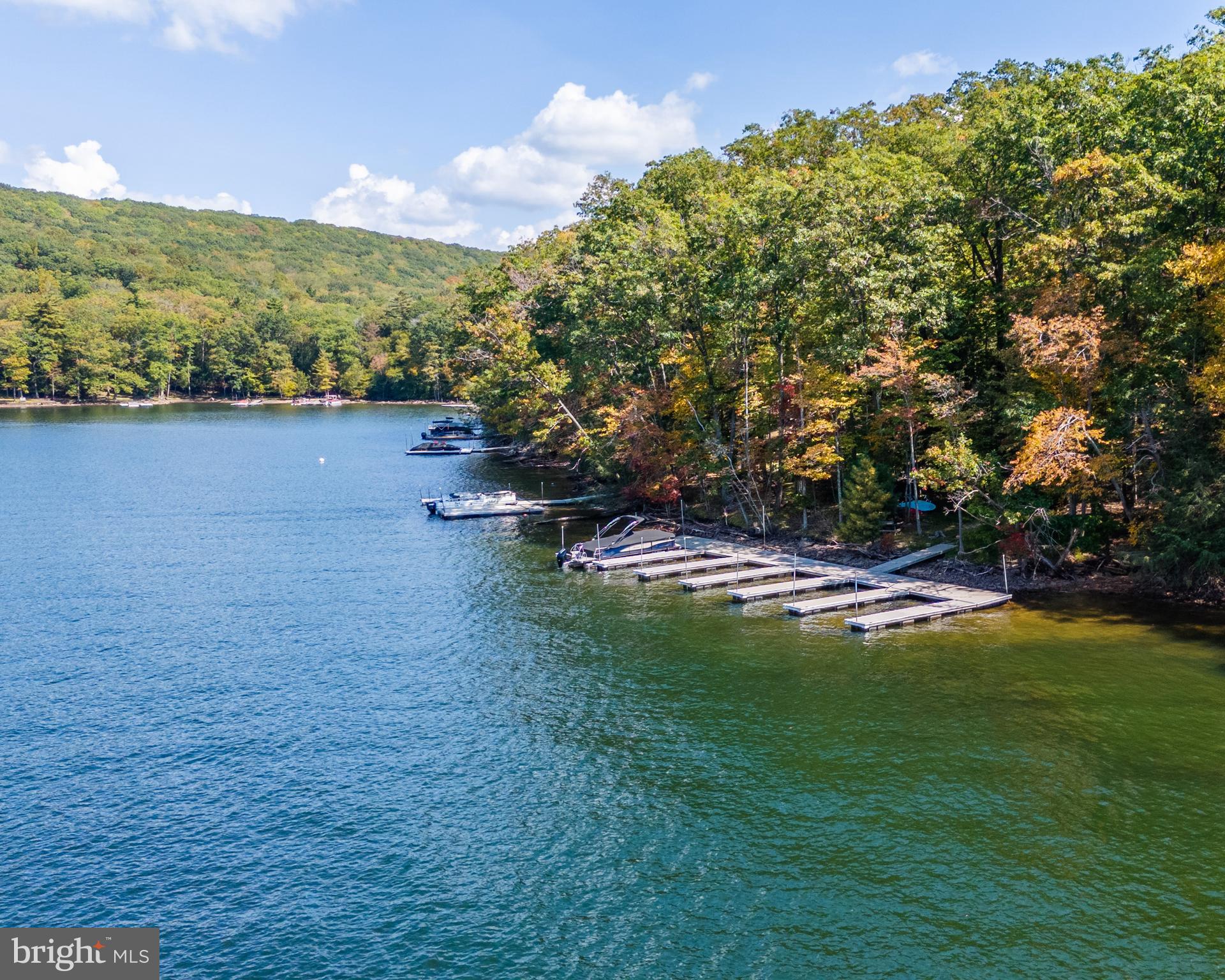 Edgewater Drive, Unit 4 Oakland, MD 21550 - Photo 16 of 16 a view of a lake with a mountain