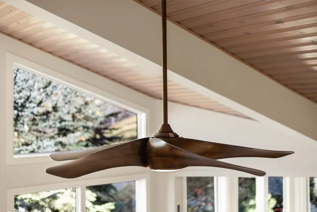 a outdoor space with lots of furniture and glass windows