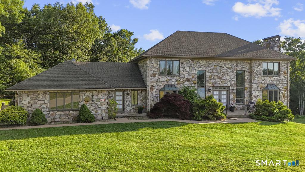 49 Partridge Lane Middletown, CT 06457 - Photo 1 of 39 front view of house with a yard