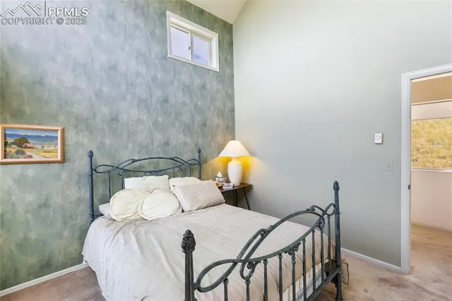 a bathroom with a sink mirror and toilet