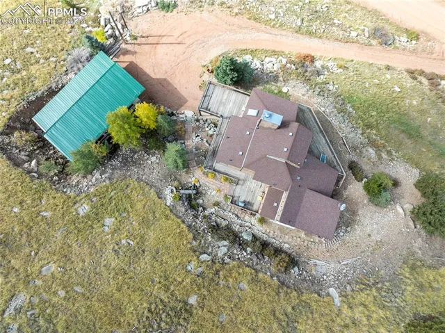 a aerial view of a house with a ocean view