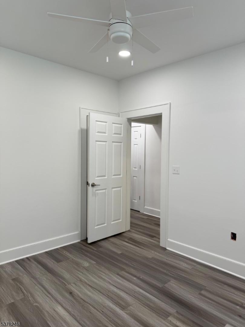 22 Baldwin Street, Unit 2 Montclair, NJ 07042 - Photo 20 of 20 wooden floor in an empty room with wooden floor