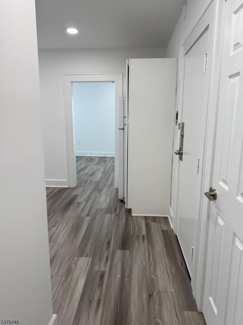 22 Baldwin Street, Unit 2 Montclair, NJ 07042 - Photo 5 of 20 wooden floor in an empty room with a gallery