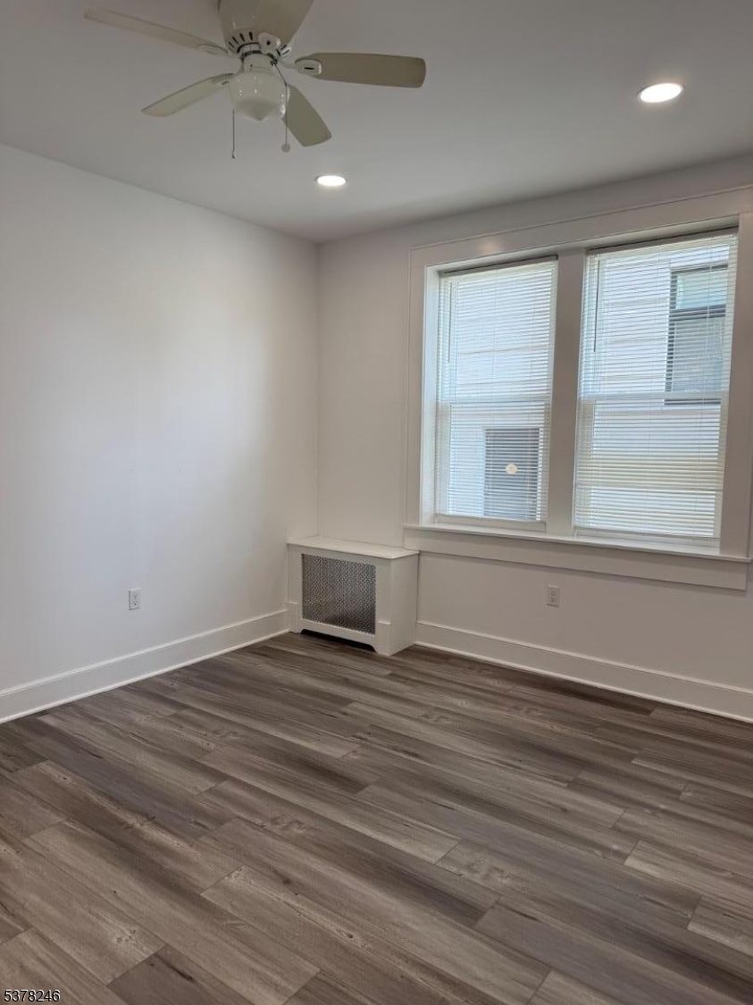 22 Baldwin Street, Unit 2 Montclair, NJ 07042 - Photo 10 of 20 wooden floor in an empty room with a window