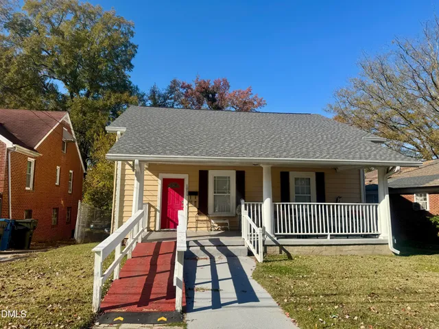 swimming pool view with a backyard space