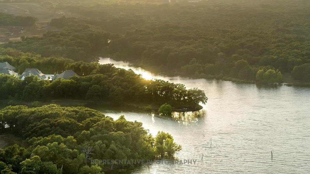 4022 Windy Point Court Oak Point, TX 75068 - Photo 30 of 33 Water view featuring a heavily wooded area