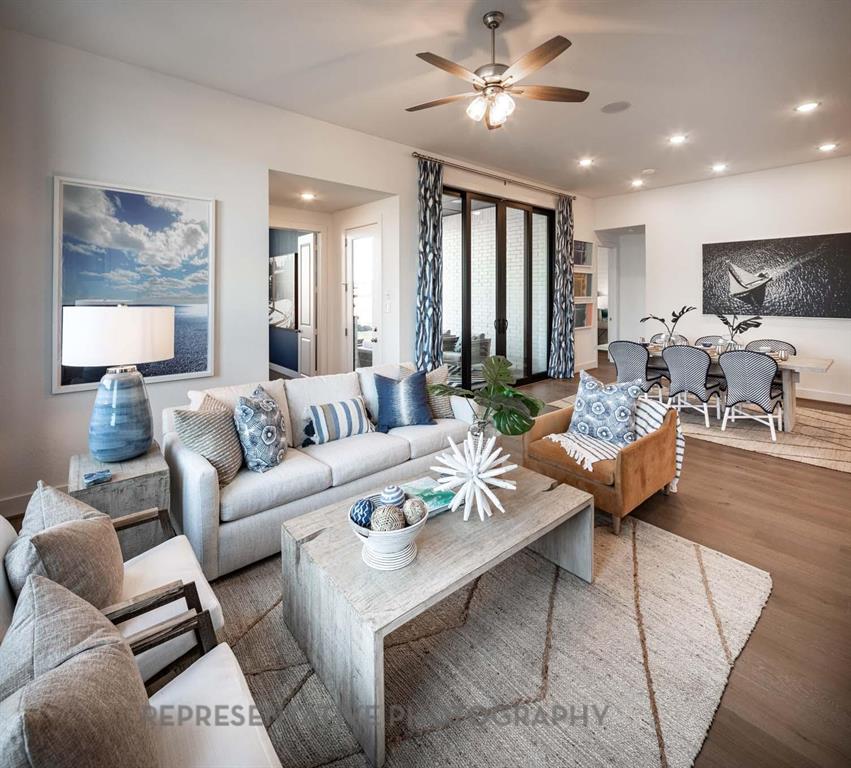 4022 Windy Point Court Oak Point, TX 75068 - Photo 7 of 33 Living area featuring wood finished floors, recessed lighting, and a ceiling fan