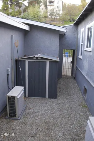a view of yard with wooden fence