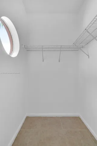 a view of a room with racks on the wall