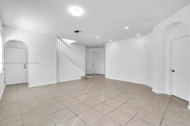 an empty room with a natural light