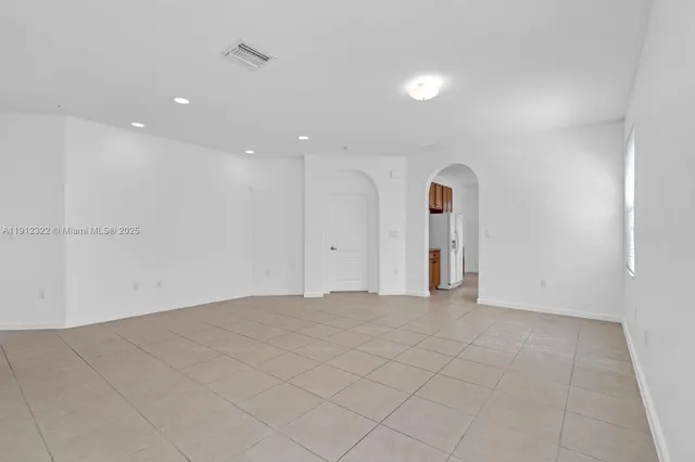 an empty room with an entryway